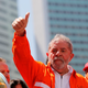 Brazil's former president Luiz Inacio Lula da Silva (C) gives the thumbs-up during a demonstration supporting both the exploration of the oil in the pre-salt layer on Brazil's offshore, as well as Brazil's Petrobras oil company, in Rio de Janeiro September 15, 2014. REUTERS/Sergio Moraes (BRAZIL - Tags: POLITICS ENERGY BUSINESS) - RTR46BCP